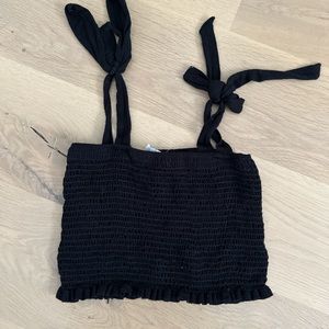 black ruffle top